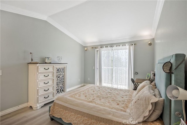 bedroom with vaulted ceiling, crown molding, light wood-style flooring, baseboards, and access to outside