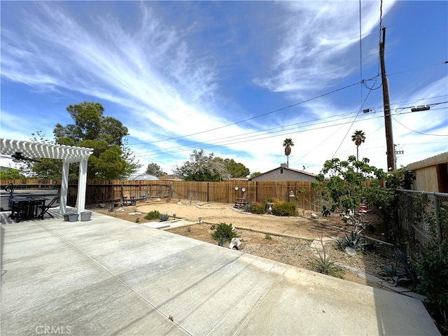 1120 S Yorktown St, Ridgecrest, CA 93555 - fenced backyard featuring a patio and a pergola