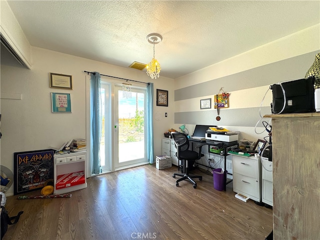 1120 S Yorktown St, Ridgecrest, CA 93555 - office area with wood finished floors, a textured ceiling, and a chandelier