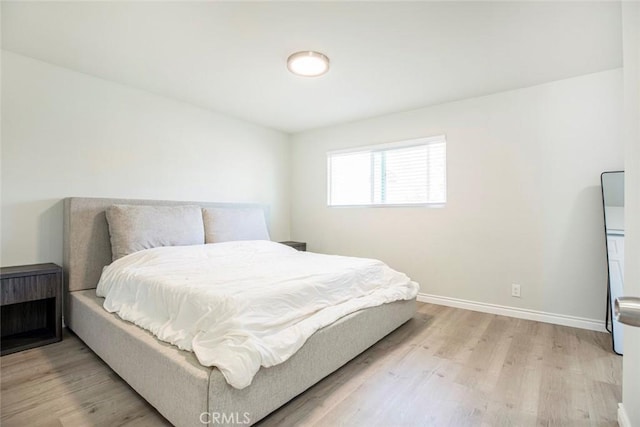 809 E Acacia Ave Unit H, Glendale, CA 91205 - bedroom featuring baseboards and light wood-style floors