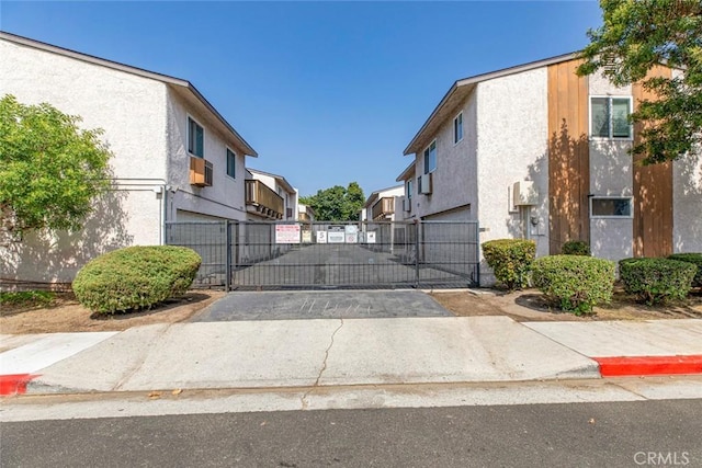 809 E Acacia Ave Unit H, Glendale, CA 91205 - view of gate featuring a residential view and fence