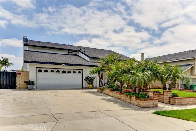 917 Brandywine Ln, Corona, CA 92880 - view of front facade featuring driveway, stucco siding, and a garage
