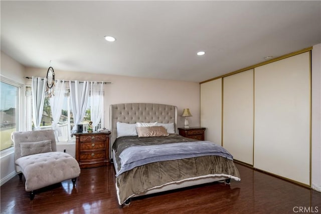 917 Brandywine Ln, Corona, CA 92880 - bedroom featuring wood finished floors, a closet, baseboards, and recessed lighting