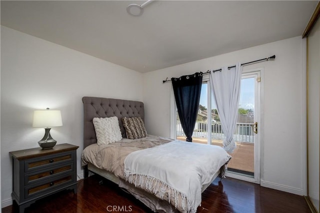 917 Brandywine Ln, Corona, CA 92880 - bedroom featuring access to exterior, baseboards, and wood finished floors