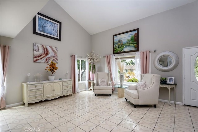 917 Brandywine Ln, Corona, CA 92880 - sitting room featuring high vaulted ceiling, light tile patterned floors, and baseboards