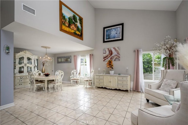 917 Brandywine Ln, Corona, CA 92880 - sitting room featuring high vaulted ceiling, a chandelier, and baseboards