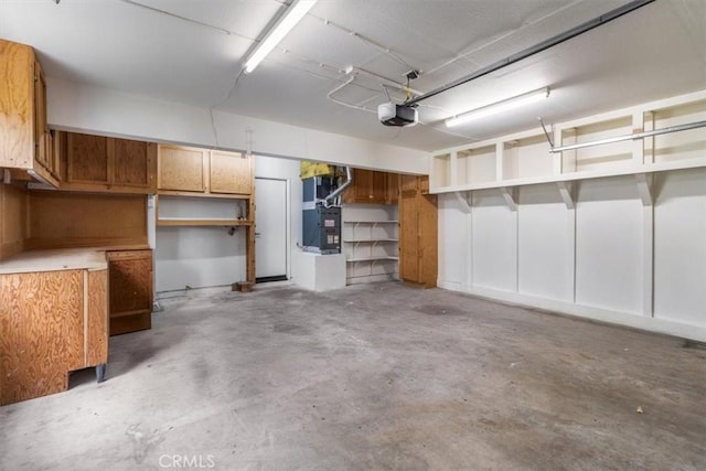 2720 E Walnut Ave Unit 10, Orange, CA 92867 - garage featuring heating unit and a garage door opener