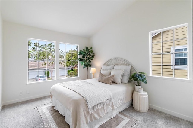 2720 E Walnut Ave Unit 10, Orange, CA 92867 - bedroom featuring baseboards, carpet flooring, and vaulted ceiling