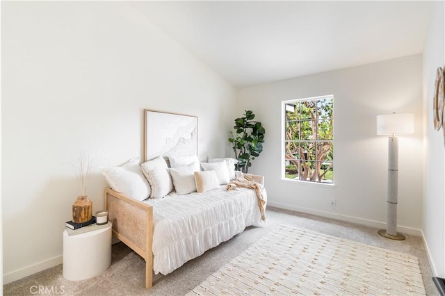 2720 E Walnut Ave Unit 10, Orange, CA 92867 - bedroom with light colored carpet, baseboards, and lofted ceiling