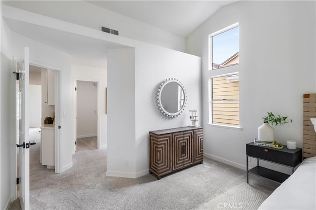 2720 E Walnut Ave Unit 10, Orange, CA 92867 - bedroom featuring carpet flooring, baseboards, and vaulted ceiling