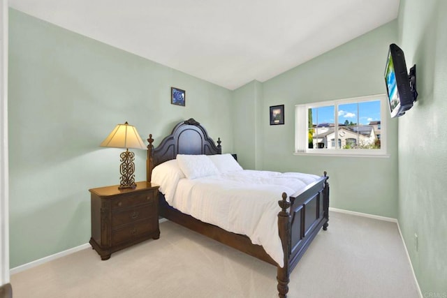 14082 Montfort Ct, San Diego, CA 92128 - bedroom with vaulted ceiling, baseboards, and light colored carpet