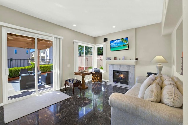 14082 Montfort Ct, San Diego, CA 92128 - living area with plenty of natural light, baseboards, a fireplace, recessed lighting, and granite floors