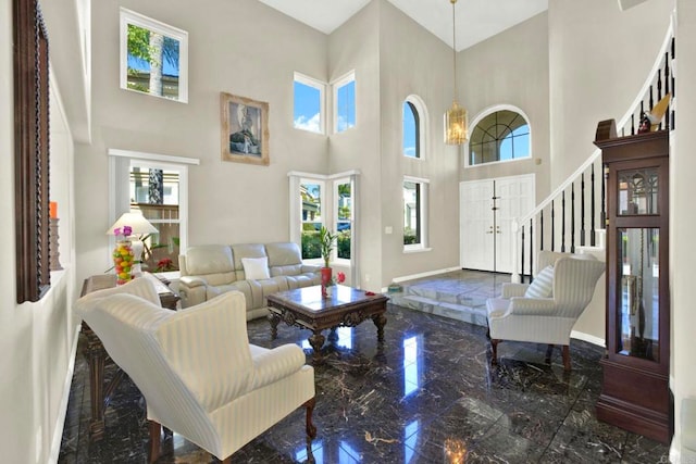14082 Montfort Ct, San Diego, CA 92128 - living area with a high ceiling, marble tiled flooring, healthy amount of natural light, and baseboards