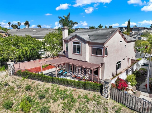 14082 Montfort Ct, San Diego, CA 92128 - back of property with a fenced backyard, a pergola, stucco siding, a tile roof, and a chimney