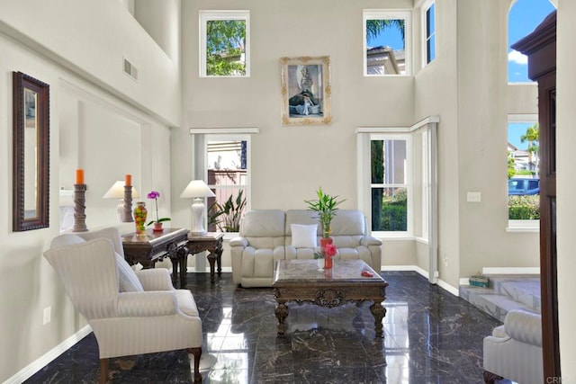 14082 Montfort Ct, San Diego, CA 92128 - living room with a high ceiling, plenty of natural light, and marble tiled floors
