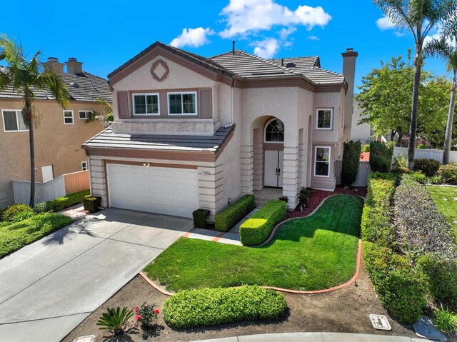 14082 Montfort Ct, San Diego, CA 92128 - view of front facade with an attached garage, driveway, stucco siding, and a chimney