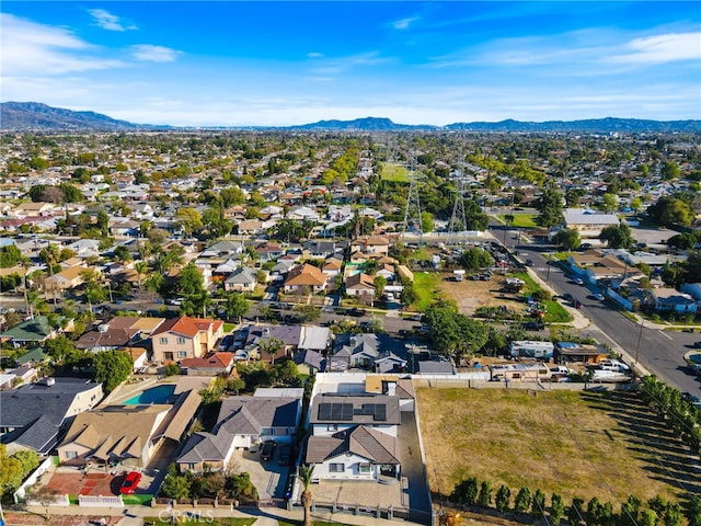 birds eye view of property featuring a residential view and a mountain view
