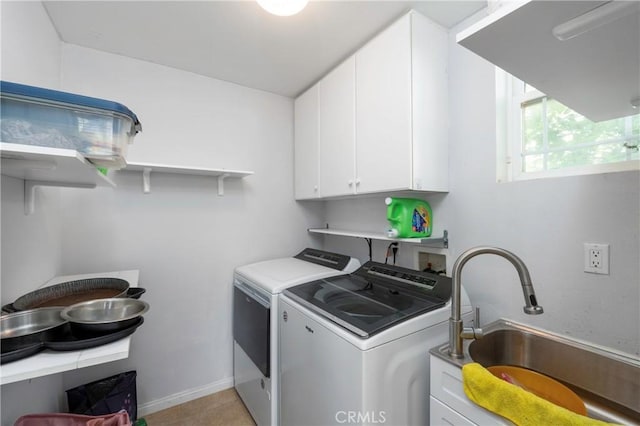 6651 Darling Ln, San Bernardino, CA 92407 - laundry room with a sink, cabinet space, baseboards, and washer and dryer