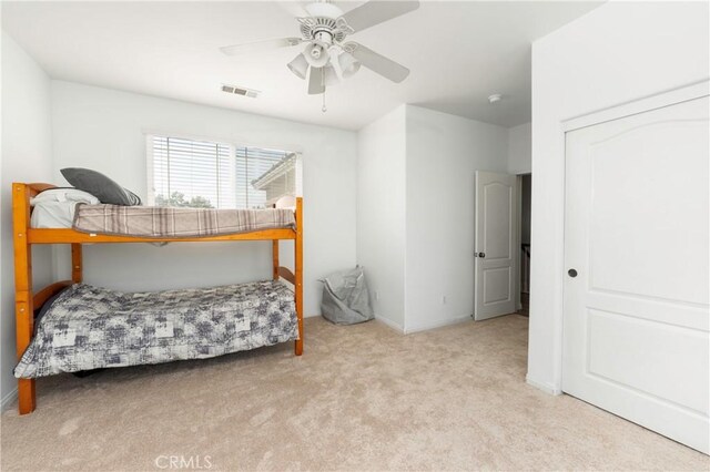 6651 Darling Ln, San Bernardino, CA 92407 - carpeted bedroom featuring ceiling fan, baseboards, and visible vents