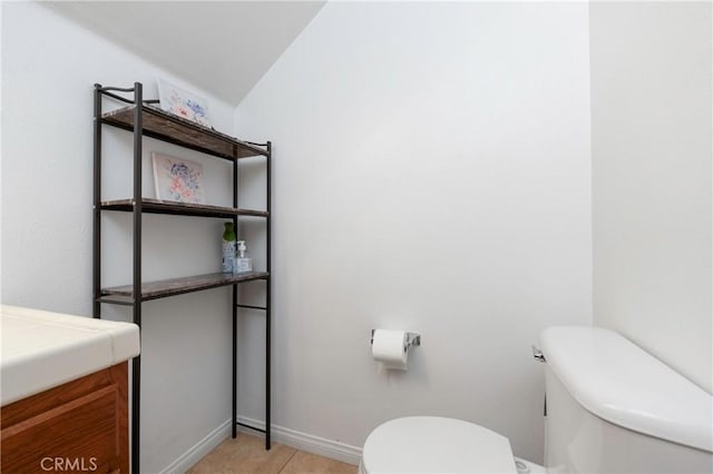 6651 Darling Ln, San Bernardino, CA 92407 - bathroom featuring vanity, toilet, and baseboards