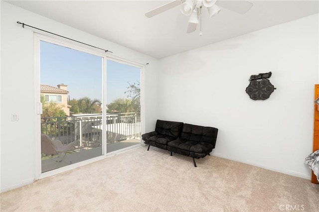 6651 Darling Ln, San Bernardino, CA 92407 - sitting room featuring carpet flooring, baseboards, and a ceiling fan