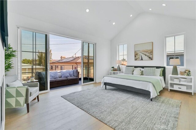 3202 Green Ln, Redondo Beach, CA 90278 - bedroom with recessed lighting, light wood-type flooring, high vaulted ceiling, and access to outside