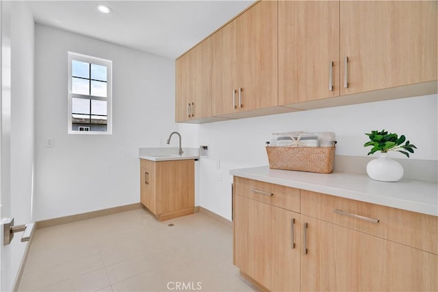 3202 Green Ln, Redondo Beach, CA 90278 - washroom with a sink, baseboards, recessed lighting, hookup for a washing machine, and cabinet space