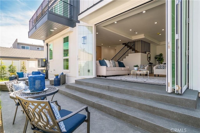 3202 Green Ln, Redondo Beach, CA 90278 - view of patio / terrace with stairway, an outdoor living space, and a balcony