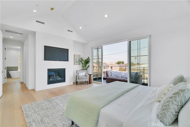 3202 Green Ln, Redondo Beach, CA 90278 - bedroom featuring light wood-type flooring, visible vents, a glass covered fireplace, recessed lighting, and access to outside