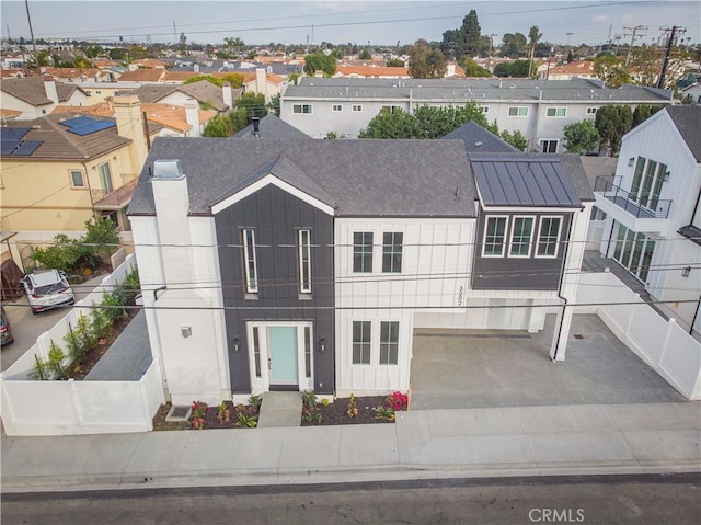 3202 Green Ln, Redondo Beach, CA 90278 - exterior space featuring fence, roof with shingles, board and batten siding, and a residential view