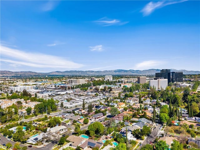 aerial view featuring a mountain view and a city view