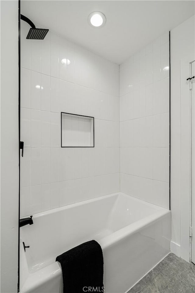 full bathroom with walk in shower and a washtub
