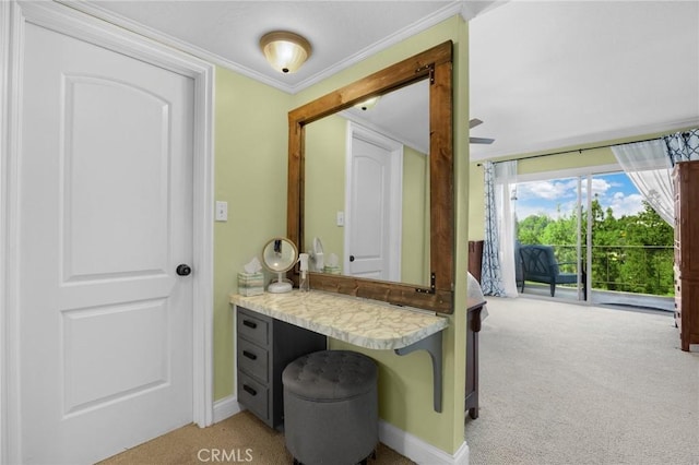bathroom with baseboards and ornamental molding