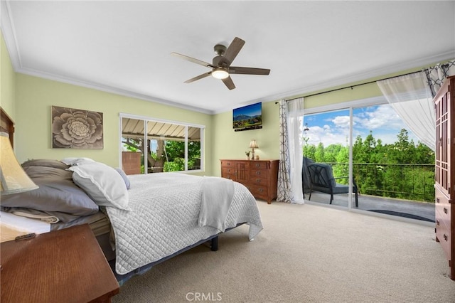 carpeted bedroom with a ceiling fan, access to outside, and crown molding