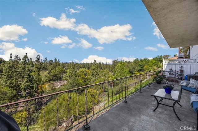 balcony with a forest view