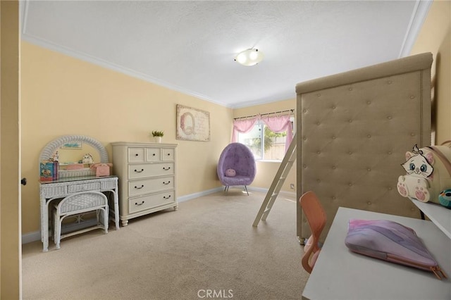 bedroom with carpet floors, baseboards, and ornamental molding