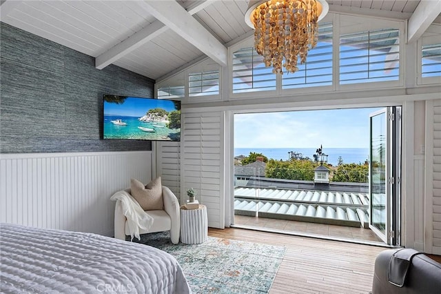 15 N Callecita, Laguna Beach, CA 92651 - bedroom with wood finished floors, beam ceiling, access to exterior, high vaulted ceiling, and wainscoting