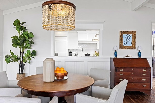 15 N Callecita, Laguna Beach, CA 92651 - dining space with dark wood-type flooring, a chandelier, and wainscoting
