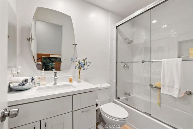 23 Pemberton Pl Unit 121, Laguna Niguel, CA 92677 - bathroom featuring enclosed tub / shower combo, toilet, and vanity