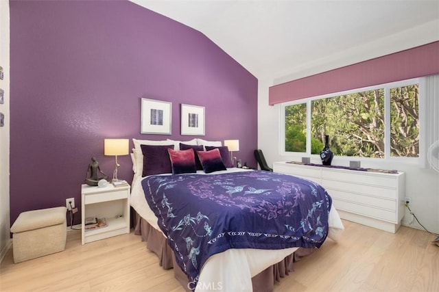 23 Pemberton Pl Unit 121, Laguna Niguel, CA 92677 - bedroom featuring lofted ceiling and wood finished floors