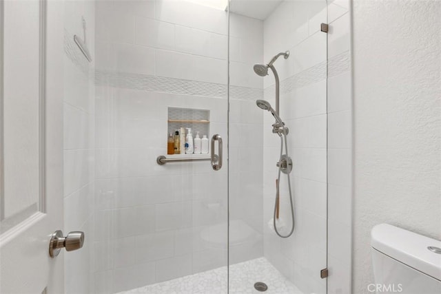 23 Pemberton Pl Unit 121, Laguna Niguel, CA 92677 - bathroom with toilet and a stall shower