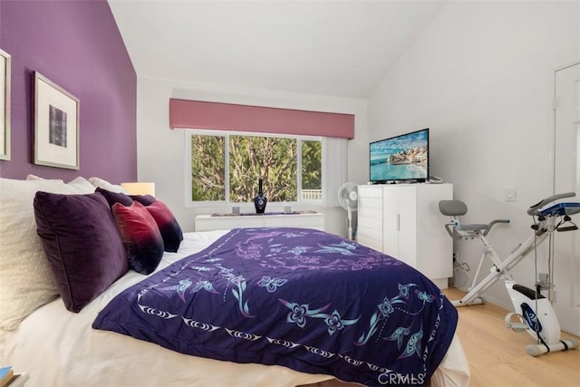 23 Pemberton Pl Unit 121, Laguna Niguel, CA 92677 - bedroom with vaulted ceiling and wood finished floors