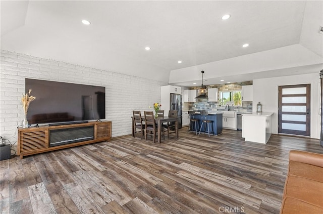 living room featuring dark wood-style floors and recessed lighting