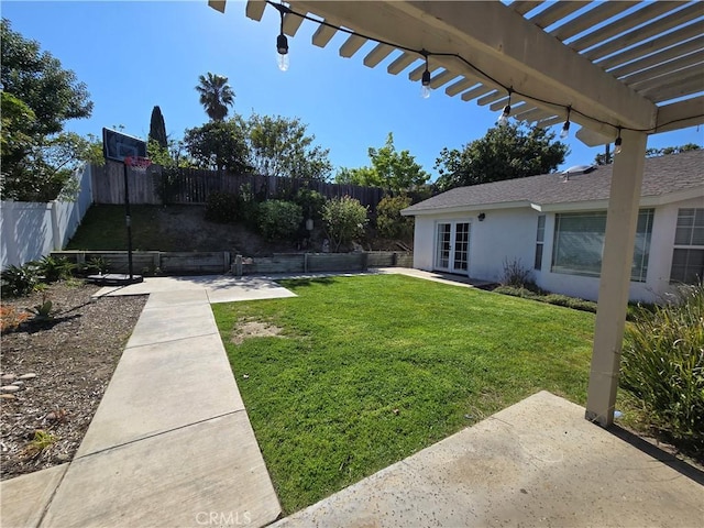 view of yard with a fenced backyard, a pergola, a patio, and french doors