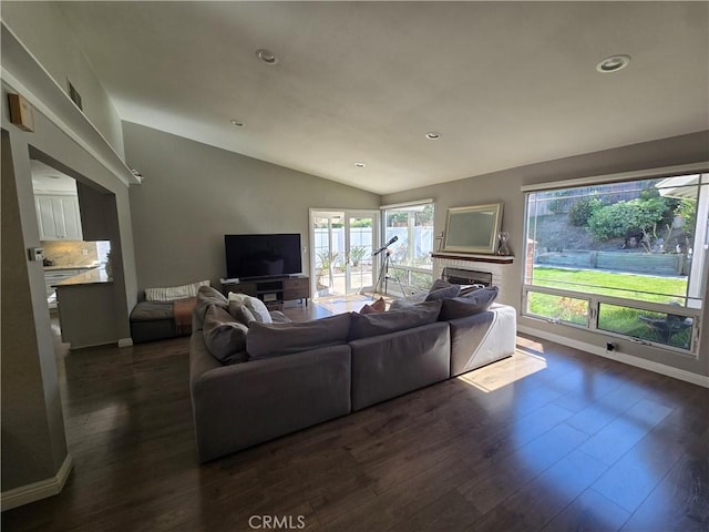 living room with recessed lighting, vaulted ceiling, baseboards, and dark wood-style flooring