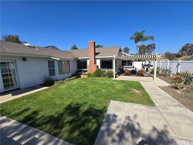 exterior space featuring fence, a patio, and a pergola