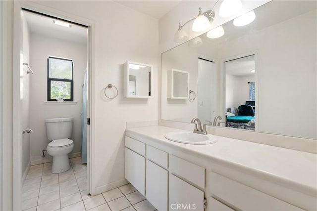 1 Quail Ridge Dr, Atascadero, CA 93422 - bathroom featuring tile patterned flooring, vanity, toilet, baseboards, and ensuite bath