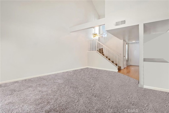 1 Quail Ridge Dr, Atascadero, CA 93422 - carpeted spare room with stairway, baseboards, and high vaulted ceiling