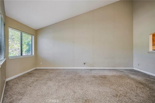 4032 Gray Stone Ct, Kelseyville, CA 95451 - carpeted spare room with baseboards and lofted ceiling