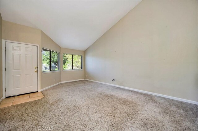 4032 Gray Stone Ct, Kelseyville, CA 95451 - unfurnished room featuring vaulted ceiling, baseboards, and light colored carpet